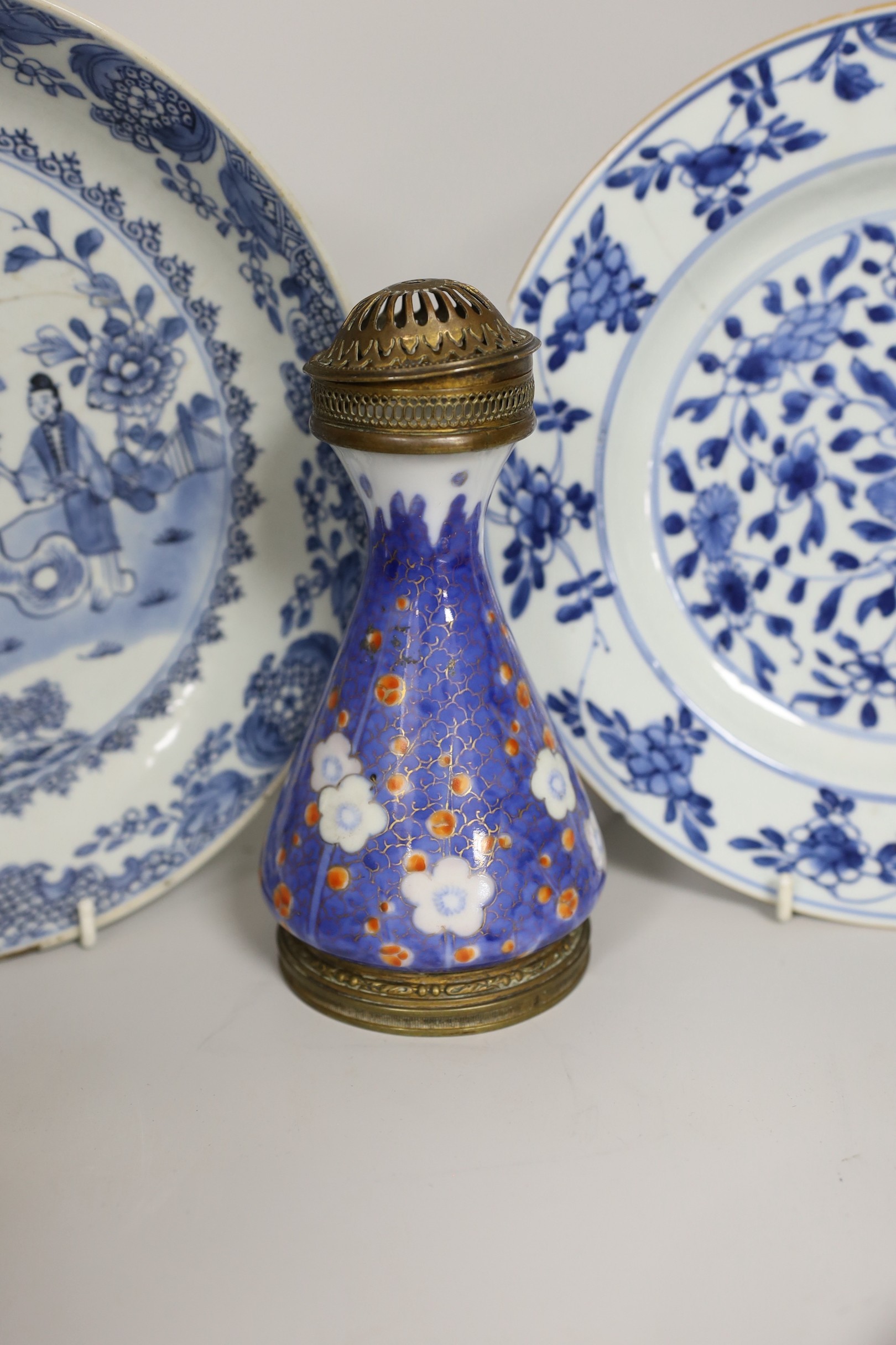 Three Chinese blue and white dishes and a bowl, together with an Imari vase. Largest 23cm diameter